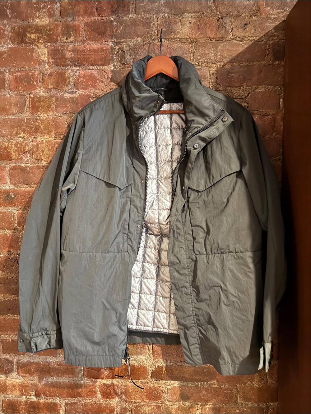 2-in-1 NIKE SPORTSWEAR TECH PACK SYNTHETIC FILL JACKET ($290)